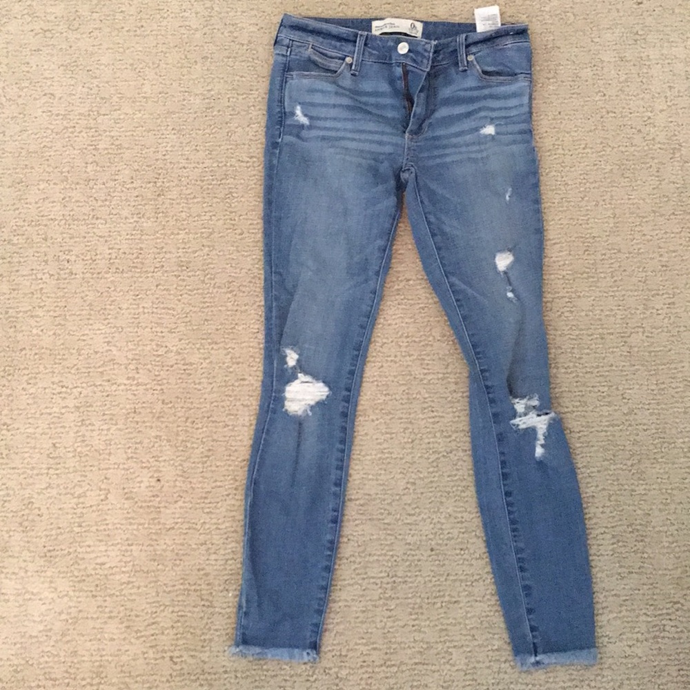 ripped blue skinny jeans